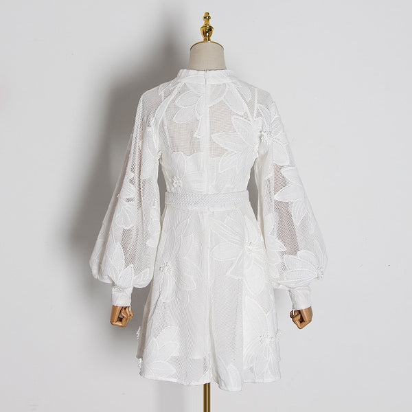 white long sleeve broderie mini dress